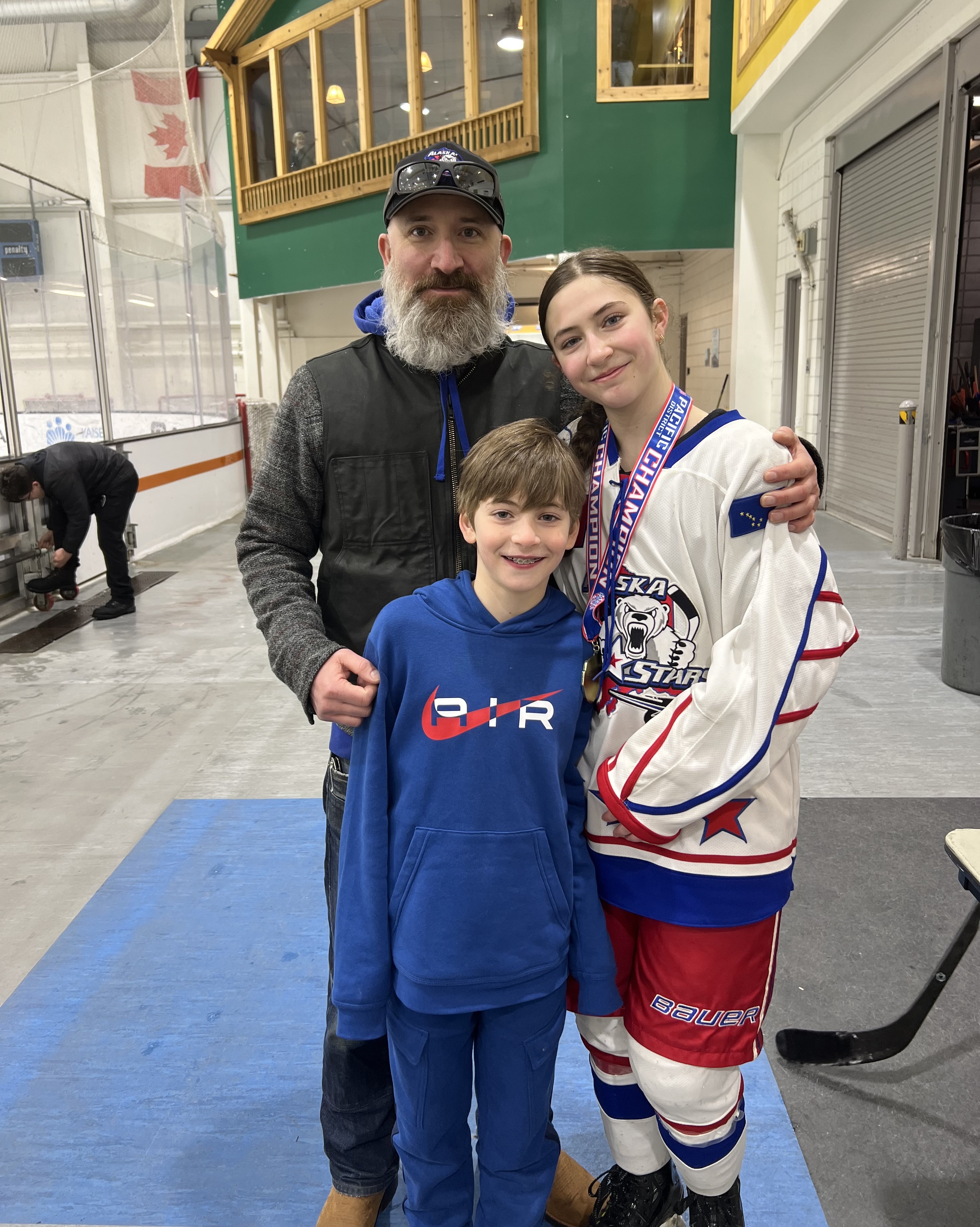 2024 October 22 -  Weekly Member Feature - Josh Hodes - Josh with kids - hockey